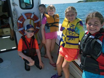 Nature Explorers
MattRec and the Marion Natural History Museum partnered for the second year to provide "Nature Explorers" summer program. The students explored several different locations around Mattapoisett this year.  We visited Land Trust property off Mattapoisett Neck Road and Bob Field gave us a tour of his Oyster farming operation. We visited salt marshes, went crabbing, netted many fish at Reservation beach, Aucoot Beach, and Ned's Point.   Photo courtesy Elizabeth Leidhold  
