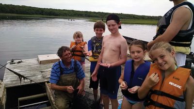 Nature Explorers
MattRec and the Marion Natural History Museum partnered for the second year to provide "Nature Explorers" summer program. The students explored several different locations around Mattapoisett this year.  We visited Land Trust property off Mattapoisett Neck Road and Bob Field gave us a tour of his Oyster farming operation. We visited salt marshes, went crabbing, netted many fish at Reservation beach, Aucoot Beach, and Ned's Point.   Photo courtesy Elizabeth Leidhold  
