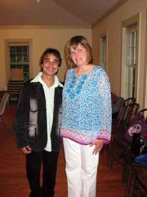 Ongoing Journey
Rajesh Shahi, of Katmandu, Nepal (left) and Johanna Duponte, of Mattapoisett, displayed information about Mr. Shahi's Sanga-Sangai  "Together" Program, which helps orphaned Nepalese children, at the Quaker Meeting Community Hall in Mattapoisett on June 7. Mr. Shahi first visited Mattapoisett in 1993. Photo by Adam Silva.


