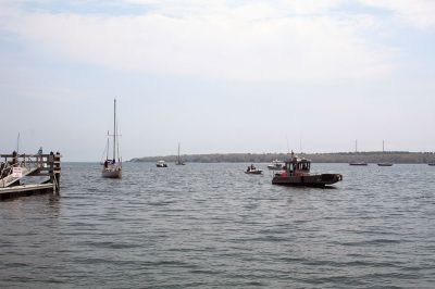 Cooper Newton 
Cooper Newton received an emotional welcome home from his parents Peter and Marley Newton, his girlfriend Autumn Horsey and a host of extended family and friends. The Mattapoisett native sailed his 27-foot boat Why Worry on a solo journey that took him as far as Turks and Caicos south of the Bahamas. His adventures included a surprise passenger in a raccoon that found his boat during a coastal storm. Photos by Mick Colageo and Cooper Newton
