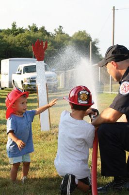 Police Patrol 
Tuesday, August 1, was National Night Out at ORR and across the country, with local Tri-Town and regional police departments hosting the event aimed at raising awareness of community police efforts. Photos by Jean Perry
