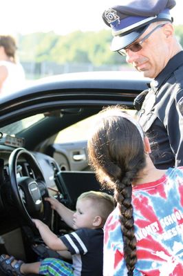 Police Patrol 
Tuesday, August 1, was National Night Out at ORR and across the country, with local Tri-Town and regional police departments hosting the event aimed at raising awareness of community police efforts. Photos by Jean Perry
