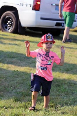 Police Patrol 
Tuesday, August 1, was National Night Out at ORR and across the country, with local Tri-Town and regional police departments hosting the event aimed at raising awareness of community police efforts. Photos by Jean Perry
