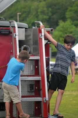 National Night Out
EEE can’t stop the NNO! (And neither can a little rain and thunder.) Despite an EEE “high risk” alert, the 7th annual Tri-Town National Night Out on Tuesday, August 6, was underway in front of ORR attracting locals to enjoy a summer afternoon of interacting with our emergency first responders and exploring the tools of their trade. Photos by Jonathan Comey
