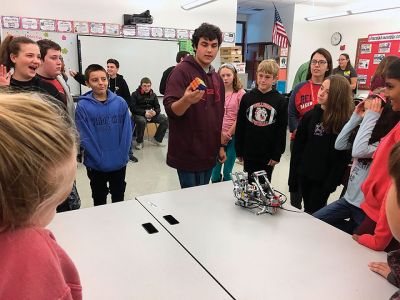 Old Colony “Vex team”
Old Colony “Vex team” engineering students visited Old Hammondtown School on October 24 and showed off some mad robotics skills. Jake Amadea, Tyler Blanchette, Jared Boren, Austin DeSousa, Chris Lambert, Isabella Mauradian, and Leandra Stroud-Jackson from Daniel Brush’s class showed OHS students how they built, programmed, and now operate their robots; something each of the OC engineering students is passionate about. Photos by Lisa Lourenco and E.O. Bednarczyk
