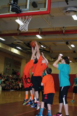 OHBBall 4131
In a close game, the Old Hammondtown School students outplayed the Old H teachers 41-40 during the annual students vs. teachers basketball game Friday night. The game was held at the ORR gymnasium and bleachers were packed with families and supporters. Photos by Jean Perry
