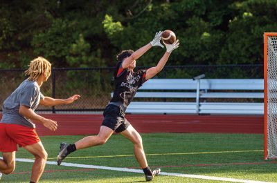 Old Rochester Regional High School football team
the Old Rochester Regional High School football team during a recent game in the Cape Cod 7v7 League, a traditional Wednesday night tune-up schedule for the MIAA fall season that fast approaches. Photos by Ryan Feeney
