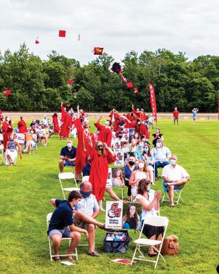 ORR Class of 2020
Old Rochester’s graduating class tosses their Graduation Caps in the air to celebrate graduating during the ceremony held on August 8, 2020. Photo by Ryan Feeney
