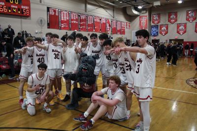 ORRHS Boys’ Basketball 
The Old Rochester Regional High School boys’ basketball team had the support of a packed gymnasium for MIAA Division 3 tournament wins over Foxboro, Salem (pictured) and Dover-Sherborn. Having run the table on home court, the second-seeded Bulldogs went to Worcester State on Monday night and defeated Pittsfield to earn a spot in the state championship this weekend in Lowell. Photo by Mick Colageo
