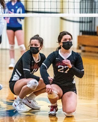 Old Rochester Regional High School Girls Volleyball
Senior co-captain Kailee Rodrigues sets the ball for her hitters, senior co-captain Meg Horan (11) and junior Maggie Brogioli (23), during the Old Rochester Regional High School girls volleyball team’s victory on Monday night at Fairhaven. The undefeated Bulldogs (11-0) open the South Coast Conference playoffs on Friday, April 30, on their home court in Mattapoisett. Photo by Ryan Feeney
