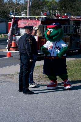 Opening Day
It was Opening Day  for the Old Rochester Little League April 28th. Wally the Green Monster and Former Red Sox Pitcher and South Coast native Brian Rose were on hand for the parade and opening ceremony. Photo by Felix Perez.
