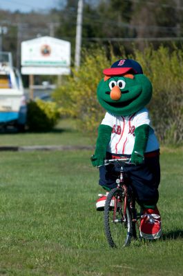 Opening Day
It was Opening Day  for the Old Rochester Little League April 28th. Wally the Green Monster and Former Red Sox Pitcher and South Coast native Brian Rose were on hand for the parade and opening ceremony. Photo by Felix Perez.
