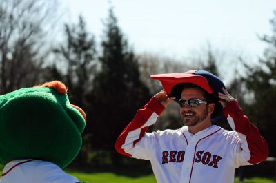 Opening Day
It was Opening Day  for the Old Rochester Little League April 28th. Wally the Green Monster and Former Red Sox Pitcher and South Coast native Brian Rose were on hand for the parade and opening ceremony. Photo by Felix Perez. More photos on page 60 and on line at wanderer.com
