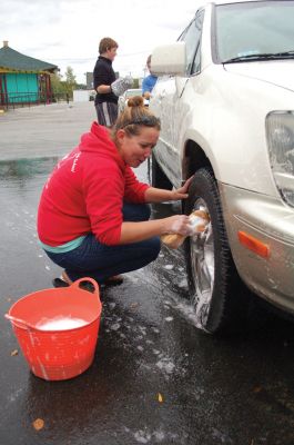 ORR Sail Car Wash
Members of the Old Rochester Regional High School Sailing Club soaped, scrubbed and washed cars on Sunday, October 3, 2010 at the Mattapoisett Fire Station. All proceeds of the fundraiser supported the Sailing Club at ORRHS. Photos by Felix Perez.
