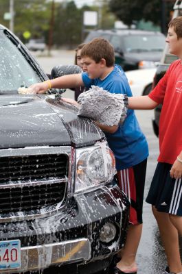 ORR Sail Car Wash
Members of the Old Rochester Regional High School Sailing Club soaped, scrubbed and washed cars on Sunday, October 3, 2010 at the Mattapoisett Fire Station. All proceeds of the fundraiser supported the Sailing Club at ORRHS. Photos by Felix Perez.
