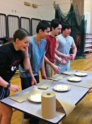 ORRHS Class Olympics
Representatives from each class prepare to dig into a chocolate pudding pie with whipped cream face-first at the pie eating contest at the ORRHS Class Olympics, Photo by Renae Reints
