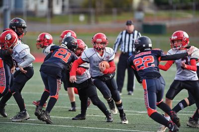 Old Rochester Youth Football 
Connor Nelson of the Old Rochester Youth Football 12-and-under team holds the snap as Giovanni Scherer kicks a field goal during the Bulldogs’ recent 30-24 victory over previously undefeated Manchester, Connecticut. Photo courtesy of Phil Mello
