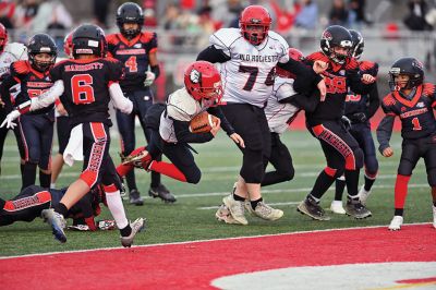 Old Rochester Youth Football 
Connor Nelson of the Old Rochester Youth Football 12-and-under team holds the snap as Giovanni Scherer kicks a field goal during the Bulldogs’ recent 30-24 victory over previously undefeated Manchester, Connecticut. Photo courtesy of Phil Mello
