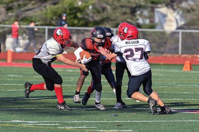 Old Rochester Youth Football 
Connor Nelson of the Old Rochester Youth Football 12-and-under team holds the snap as Giovanni Scherer kicks a field goal during the Bulldogs’ recent 30-24 victory over previously undefeated Manchester, Connecticut. Photo courtesy of Phil Mello
