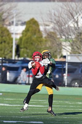 Old Rochester Youth Football’s
Old Rochester Youth Football’s 12-and-under team was the last Massachusetts entry among the eight programs represented in the four New England Pop Warner Regional Championship games held on Saturday at New Milford (Connecticut) High School. The Bulldogs earned some opportunities, thanks to great defensive plays like Nicholas Giokas’ first-quarter interception, a fumble forced by Benjamin Baptiste and recovered by David Medeiros Jr., 
