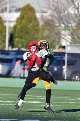 Old Rochester Youth Football’s
Old Rochester Youth Football’s 12-and-under team was the last Massachusetts entry among the eight programs represented in the four New England Pop Warner Regional Championship games held on Saturday at New Milford (Connecticut) High School. The Bulldogs earned some opportunities, thanks to great defensive plays like Nicholas Giokas’ first-quarter interception, a fumble forced by Benjamin Baptiste and recovered by David Medeiros Jr., 
