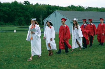 ORR Grads
Old Rochester Regional High School held commencement ceremonies for the Class of 2009 on Saturday, June 6 at David S. Hagen Memorial Field on the ORR campus. An overflow crowd of family, friends and faculty was on hand to look on as over 150  graduates received their diplomas. Photo by Robert Chiarito.
