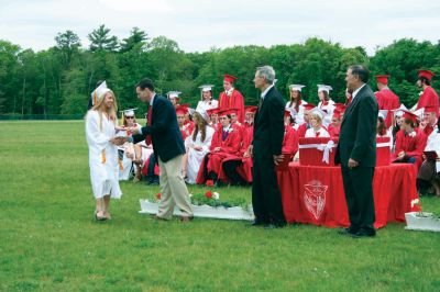 ORR Grads
Old Rochester Regional High School held commencement ceremonies for the Class of 2009 on Saturday, June 6 at David S. Hagen Memorial Field on the ORR campus. An overflow crowd of family, friends and faculty was on hand to look on as over 150  graduates received their diplomas. Photo by Robert Chiarito.
