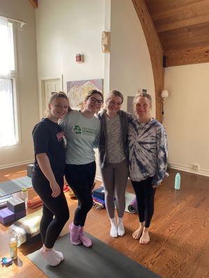 Old Rochester Regional High School Junior Class
Rather than attending a brunch or family breakfast, several mothers (and some disgruntled teens) supported the Old Rochester Regional High School Junior Class through a calm and sweaty yoga class. Led by Elke Pierre, the class boasted a full house and was influenced by the theme of motherhood. Ms. Pierre not only hosted, but taught, deejayed and planned the yoga as a huge donation of time and effort to her son Markus Pierre’s class. A
