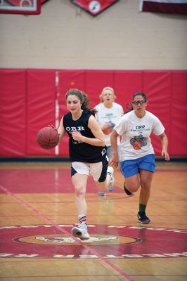 Alumni Basketball
The Old Rochester Regional High School alumni and the ORR boys’ and girls’ basketball teams shared a couple of friendly games of basketball on March 29 during the 2nd annual Old Rochester Regional Hall of Fame Alumni Hoops Classic. The women’s alumni team lost to the girls’ team 45-29, while the men’s alumni team beat the boys’ team in a close game of 75-63. Photos by Colin Veitch
