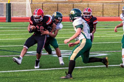 ORR Football
The Old Rochester Regional High School football team opened its season in a 42-15 defeat against Dighton-Rehoboth on March 27 in New Bedford. Above, Stephen Arne picks up a first down for the Bulldogs. Top right, Hayden Rinta (20) powers his way through the gap. Right, the Bulldogs take the play from Ryon Thomas (1). Bottom right, ORR's Jayven Pina Francis brings down D-R's Jaren Ramos. Below, Ryon Thomas throws deep down the sideline. Photos by Ryan Feeney
