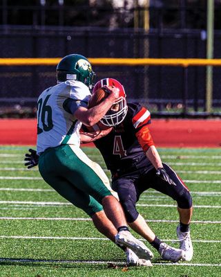 ORR Football
The Old Rochester Regional High School football team opened its season in a 42-15 defeat against Dighton-Rehoboth on March 27 in New Bedford. Above, Stephen Arne picks up a first down for the Bulldogs. Top right, Hayden Rinta (20) powers his way through the gap. Right, the Bulldogs take the play from Ryon Thomas (1). Bottom right, ORR's Jayven Pina Francis brings down D-R's Jaren Ramos. Below, Ryon Thomas throws deep down the sideline. Photos by Ryan Feeney
