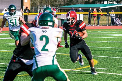 ORR Football
The Old Rochester Regional High School football team opened its season in a 42-15 defeat against Dighton-Rehoboth on March 27 in New Bedford. Above, Stephen Arne picks up a first down for the Bulldogs. Top right, Hayden Rinta (20) powers his way through the gap. Right, the Bulldogs take the play from Ryon Thomas (1). Bottom right, ORR's Jayven Pina Francis brings down D-R's Jaren Ramos. Below, Ryon Thomas throws deep down the sideline. Photos by Ryan Feeney
