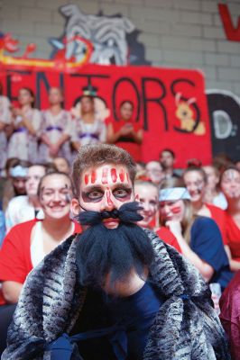 ORR Homecoming Week
Homecoming week always brings along the Friday afternoon pep rally at ORR High School when groups of students from each grade perform a skit, competing against each other for the top spot. Here, a senior performs in a skit based on the animated film Mulan. Photo by Colin Veitch 
