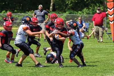 ORR Pop Warner
The ORR Pop Warner football team, led by Coach David Medeiros, topped off an undefeated season on Sunday with a 27-12 win over Taunton. Photos courtesy Phil Mello
