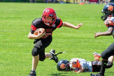 ORR Pop Warner
The ORR Pop Warner football team, led by Coach David Medeiros, topped off an undefeated season on Sunday with a 27-12 win over Taunton. Photos courtesy Phil Mello
