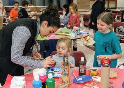 Santa’s Workshop
On the snowy night of December 15, high school students and some rambunctious kids gathered for some fun at ‘Santa’s Workshop’ in the ORRHS Cafeteria.  Senior Class President Gabriel Noble-Shriver and Vice President Rachel Demmer, along with Class of 2018 advisors Merrideth Wickman and Michael Nailor, hosted an evening of crafts, dancing, games, and a movie so parents could holiday shop. The funds raised will help defray the cost of Senior Class activities and expenses. Submitted photos by Erin Bednarczyk
