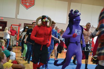 ORR Spirt Week
It was seniors versus juniors versus sophomores versus freshman at the Old Rochester Regional High School Homecoming Pep Rally on Friday, October 17. Every year, each grade competes against each other for best skit, traditionally an ORR-themed parody of a movie. Can you guess what each grade level chose for their skit? Photos by Jean Perry
