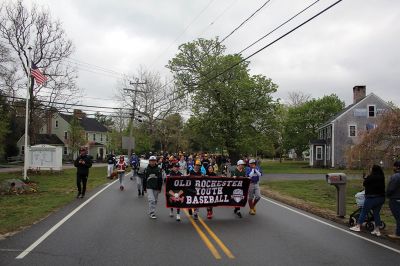 Old Rochester Youth Baseball League
The first Opening Day since 2019 brought out Old Rochester Youth Baseball League players and their families on Saturday morning in Rochester. A parade began at the Dexter Lane baseball complex and made its way to Gifford Park, where ORYB’s David Arancio recognized the many years of service from Derek Mello, Peter Vieira and David Nelson, who all threw ceremonial first pitches. Players in their final season were also recognized. Photos by Mick Colageo
