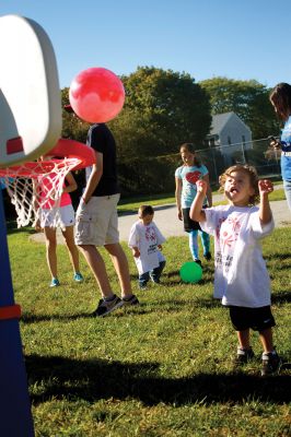 South Coast Special Olympics 
Landon Gomes of New Bedford shoots the ball at the basket while participating in the South Coast Special Olympics program, which was held at Center School in Mattapoisett on Sunday, September 23, 2012.  Photo by Eric Tripoli.
