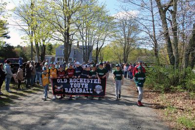 Opening Day of Old Rochester Youth Baseball
Opening Day of Old Rochester Youth Baseball brought out the crowds to hail the march from the Dexter Lane fields over to Gifford Park for ceremonies, including recognition for 12-year-old players entering their final year of little league. Photos by Mick Colageo
