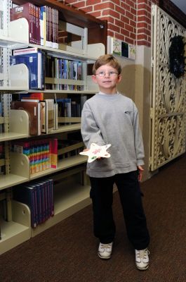 Library Crafts
On Saturday, December 19, 2009, the Mattapoisett Free Public Library hosted a ornament-making session. Children made seaside-themed holiday ornaments that included seashells, starfish, whelks, and everyone's favorite, Salty the Seahorse. Photo by Felix Perez.
