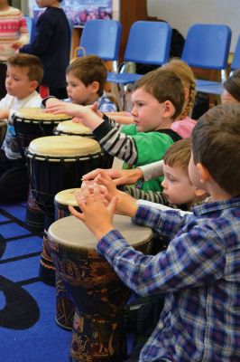 Otha Day
Drum master Otha Day spent the day with Rochester Memorial School students on November 21, giving lessons on rhythm and handing out percussion instruments, including drums and shakers, during drumming workshops held throughout the day. Photos By Jean Perry
