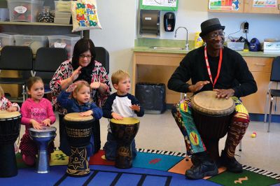 Otha Day
Drum master Otha Day spent the day with Rochester Memorial School students on November 21, giving lessons on rhythm and handing out percussion instruments, including drums and shakers, during drumming workshops held throughout the day. Photos By Jean Perry
