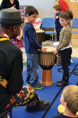 Otha Day
Drum master Otha Day spent the day with Rochester Memorial School students on November 21, giving lessons on rhythm and handing out percussion instruments, including drums and shakers, during drumming workshops held throughout the day. Photos By Jean Perry
