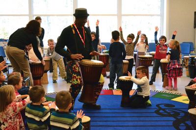 Otha Day
Drum master Otha Day spent the day with Rochester Memorial School students on November 21, giving lessons on rhythm and handing out percussion instruments, including drums and shakers, during drumming workshops held throughout the day. Photos By Jean Perry
