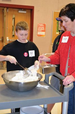 Oxfam Fundraising Banquet
At the Old Rochester Regional Junior High School on February 13, guests of the Oxfam fundraising banquet got a taste of world hunger when they symbolically experienced the inequitable distribution of wealth and resources during a dinner of either just rice, rice or beans, or a full meal of rice, beans, and baked fish, determined at random by which ticket guests received at the door. Photo by Jean Perry
