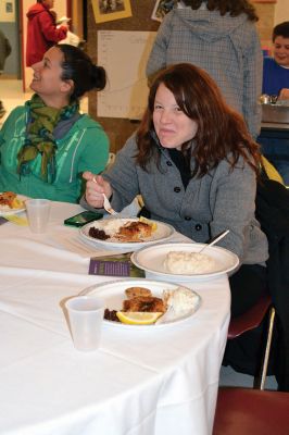 Oxfam Fundraising Banquet
At the Old Rochester Regional Junior High School on February 13, guests of the Oxfam fundraising banquet got a taste of world hunger when they symbolically experienced the inequitable distribution of wealth and resources during a dinner of either just rice, rice or beans, or a full meal of rice, beans, and baked fish, determined at random by which ticket guests received at the door. Photo by Jean Perry
