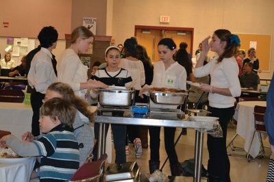 Oxfam Fundraising Banquet
At the Old Rochester Regional Junior High School on February 13, guests of the Oxfam fundraising banquet got a taste of world hunger when they symbolically experienced the inequitable distribution of wealth and resources during a dinner of either just rice, rice or beans, or a full meal of rice, beans, and baked fish, determined at random by which ticket guests received at the door. Photo by Jean Perry
