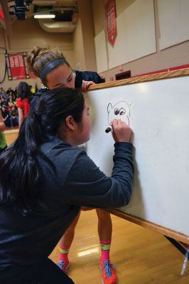 ORR Pep Rally
Principal Michael Devoll gave Old Rochester Regional High School students a “shot in the arm” of school spirit on Friday January 31 – rather overdue for a school with a varsity basketball team currently in first place, a number of losing streaks in sports that have finally come to an end, and an undefeated debate team, among other reasons for students to be proud. Photo by Jean Perry
