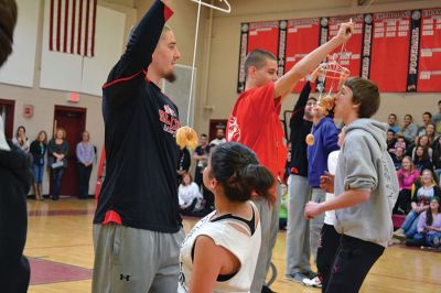 ORR Pep Rally
Principal Michael Devoll gave Old Rochester Regional High School students a “shot in the arm” of school spirit on Friday January 31 – rather overdue for a school with a varsity basketball team currently in first place, a number of losing streaks in sports that have finally come to an end, and an undefeated debate team, among other reasons for students to be proud. Photo by Jean Perry
